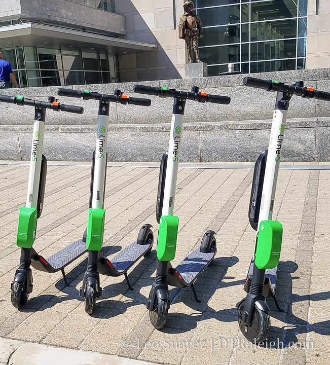 Lime scooters in front of the Raleigh Convention Center