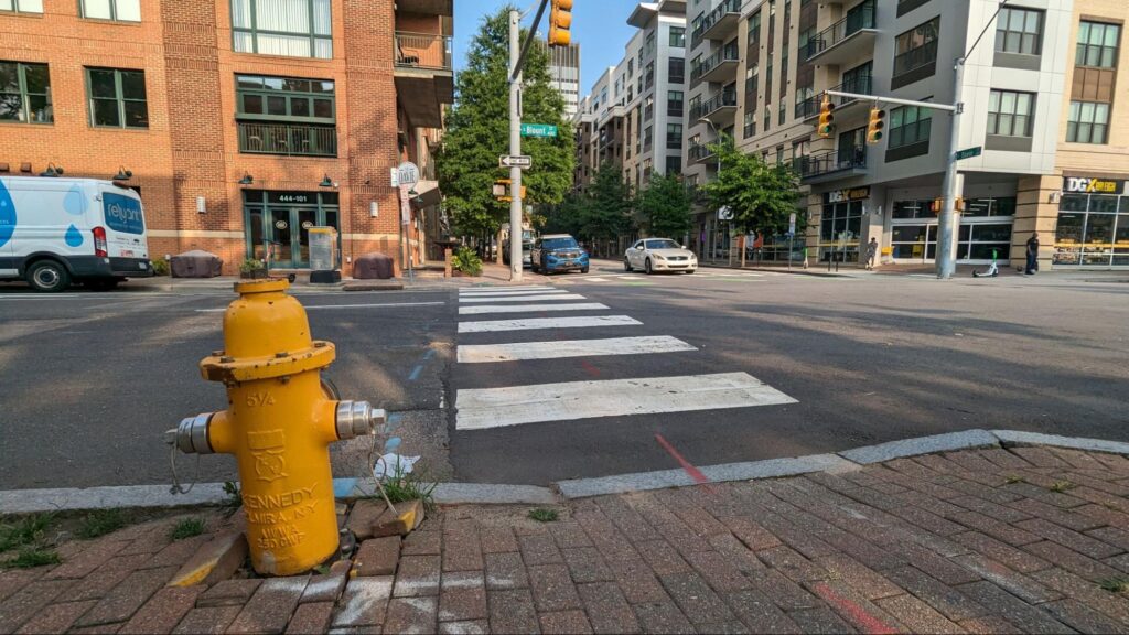 lowered curb and crosswalk on city intersection